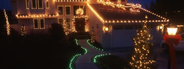 night time house with christmas lighting