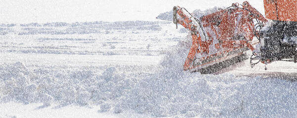 tractor plowing snow